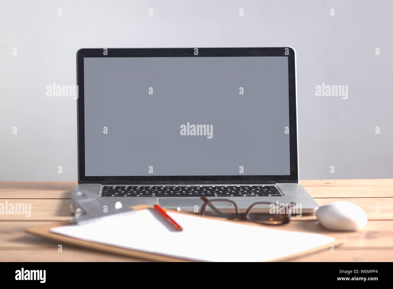 Modern laptop stands on white hi-res stock photography and images - Alamy