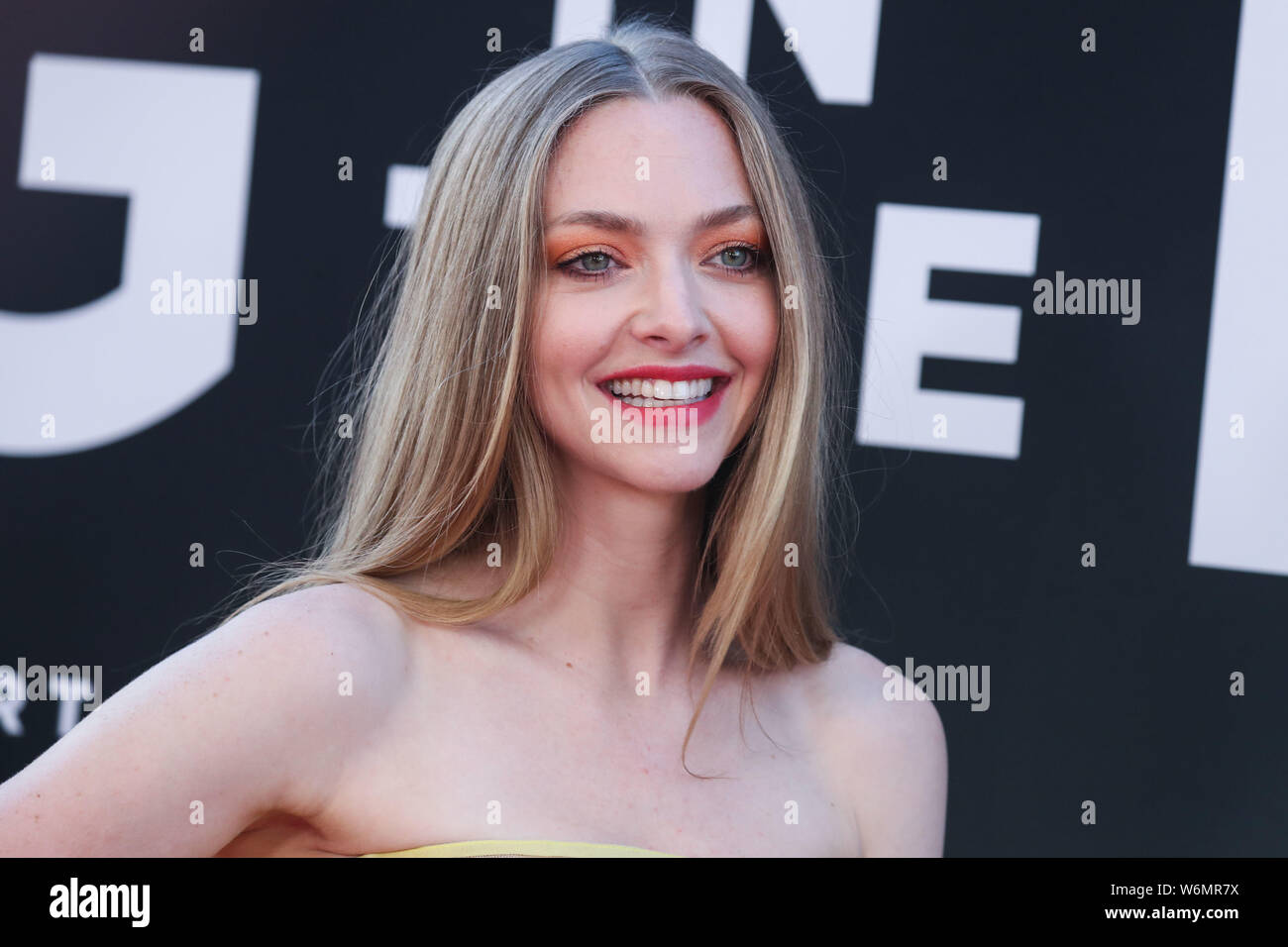 Hollywood, United States. 01st Aug, 2019. HOLLYWOOD, LOS ANGELES, CALIFORNIA, USA - AUGUST 01: Actress Amanda Seyfried wearing an Oscar de la Renta dress, Stuart Weitzman heels, and Jennifer Meyer earrings arrives at the Los Angeles Premiere Of 20th Century Fox's 'The Art Of Racing In The Rain' held at the El Capitan Theatre on August 1, 2019 in Hollywood, Los Angeles, California, United States. (Photo by Xavier Collin/Image Press Agency) Credit: Image Press Agency/Alamy Live News Stock Photo