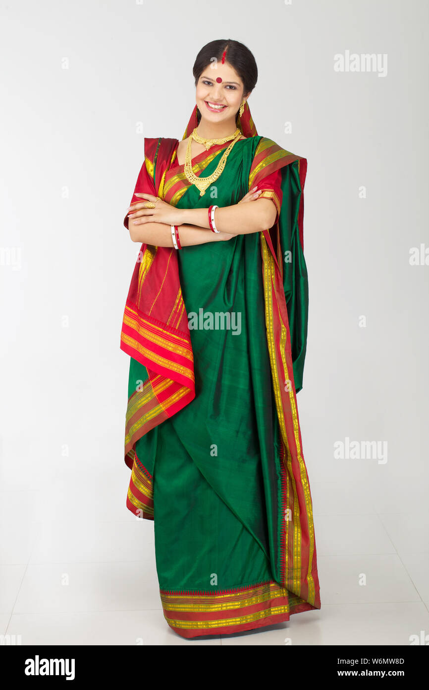 Bengali woman standing with arms crossed and smiling Stock Photo Alamy