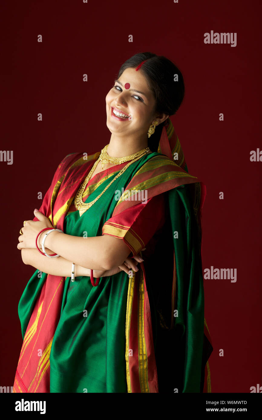 Bengali woman smiling with arms crossed and smiling Stock Photo Alamy