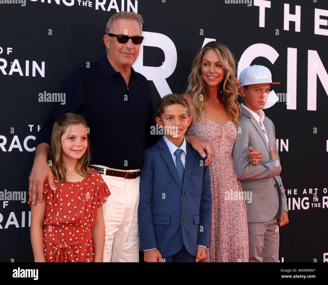 August 1, 2019, Los Angeles, CA, USA: LOS ANGELES - AUG 1:  Grace Avery Costner, Kevin Costner, Cayden Wyatt Costner, Christine Baumgartner, Hayes Logan Costner at the ''The Art of Racing in the Rain'' World Premiere at the El Capitan Theater on August 1, 2019 in Los Angeles, CA (Credit Image: © Kay Blake/ZUMA Wire) Stock Photo