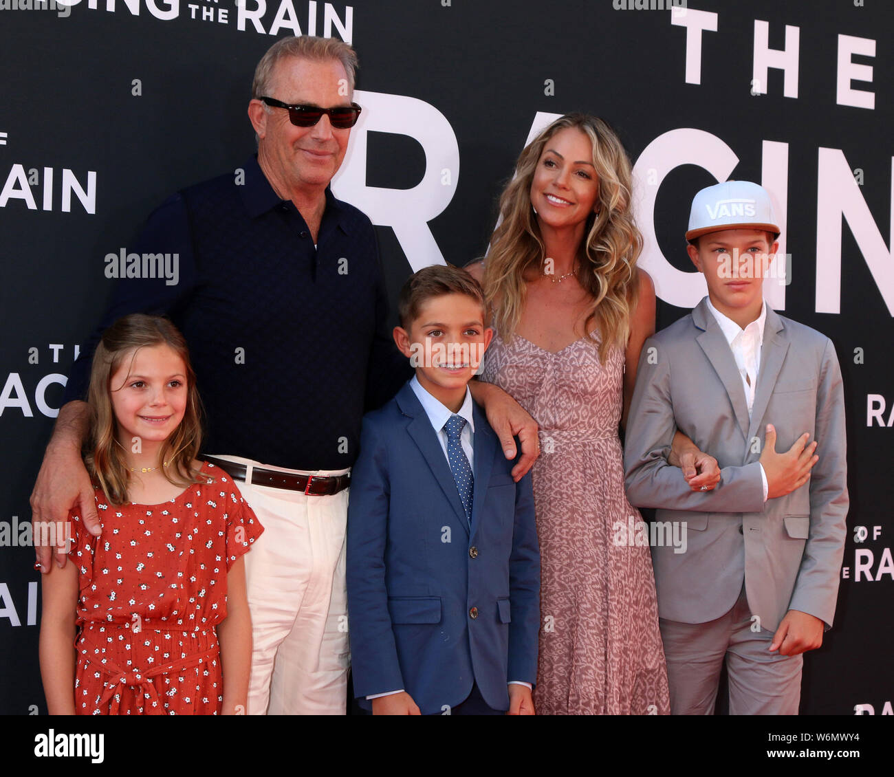 August 1, 2019, Los Angeles, CA, USA: LOS ANGELES - AUG 1:  Grace Avery Costner, Kevin Costner, Cayden Wyatt Costner, Christine Baumgartner, Hayes Logan Costner at the ''The Art of Racing in the Rain'' World Premiere at the El Capitan Theater on August 1, 2019 in Los Angeles, CA (Credit Image: © Kay Blake/ZUMA Wire) Stock Photo