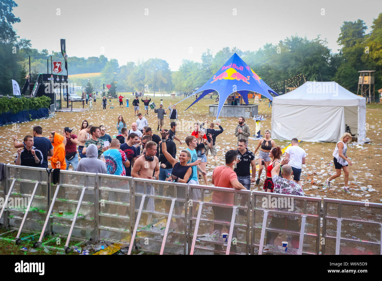 Brezje, Croatia - 20th July, 2019 : Crowd during morning of the second day of the Forestland, ultimate forest electronic music festival located in Bre Stock Photo