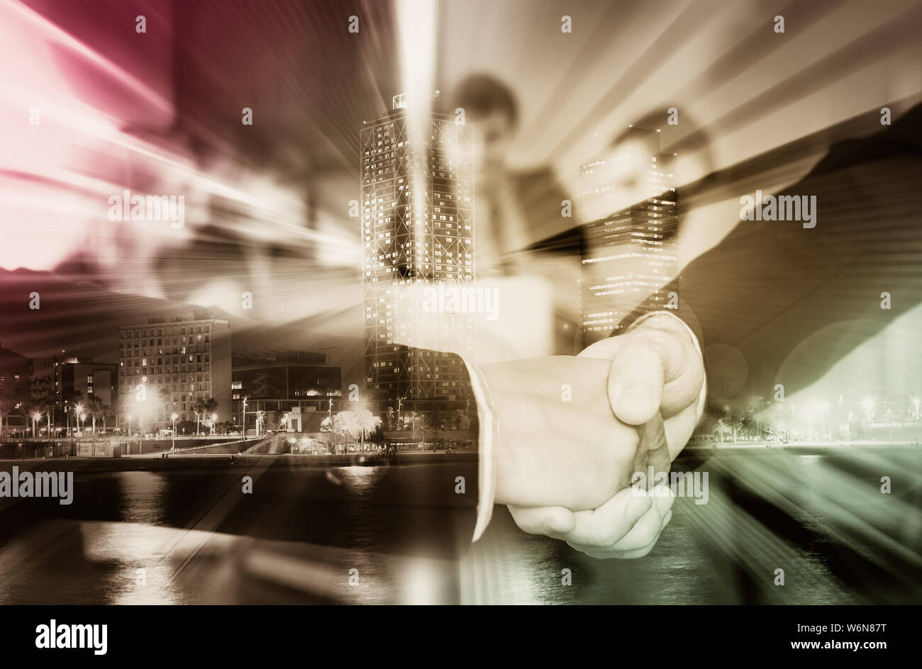 Strong handshake of businessmen confirming successful business ...