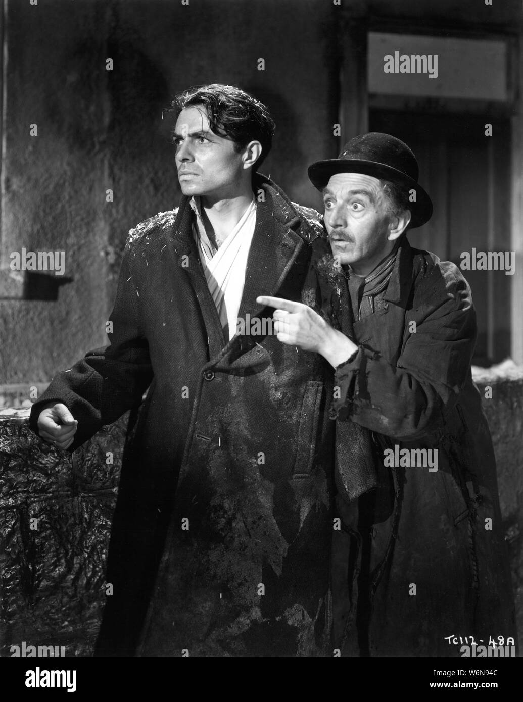 JAMES MASON and F.J. McCORMICK in ODD MAN OUT 1947 director CAROL REED novel F.L. Green screenplay F.L. Green and R.C. Sherriff  Two Cities Films / General Film Distributors (GFD) Stock Photo