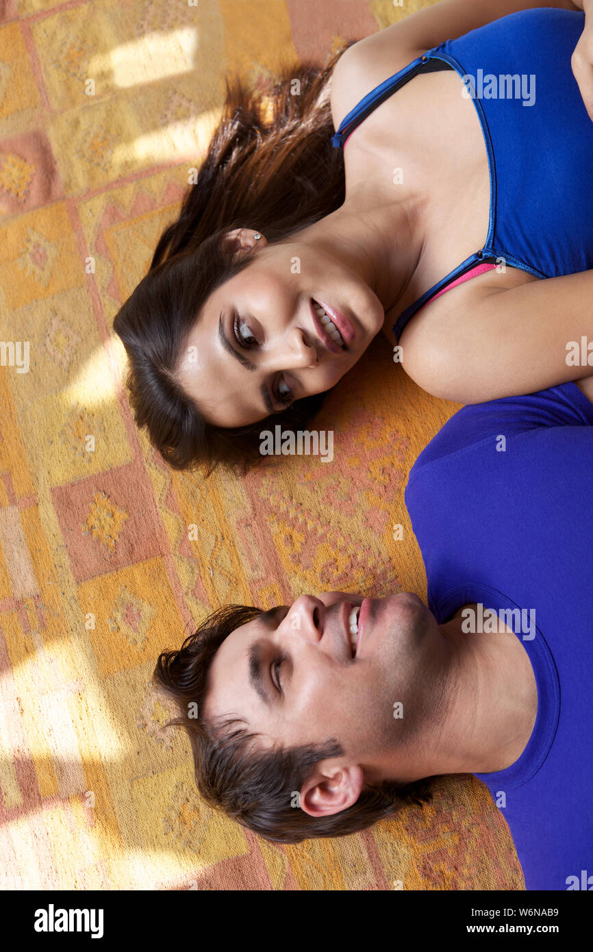 High angle view of a couple lying down Stock Photo - Alamy