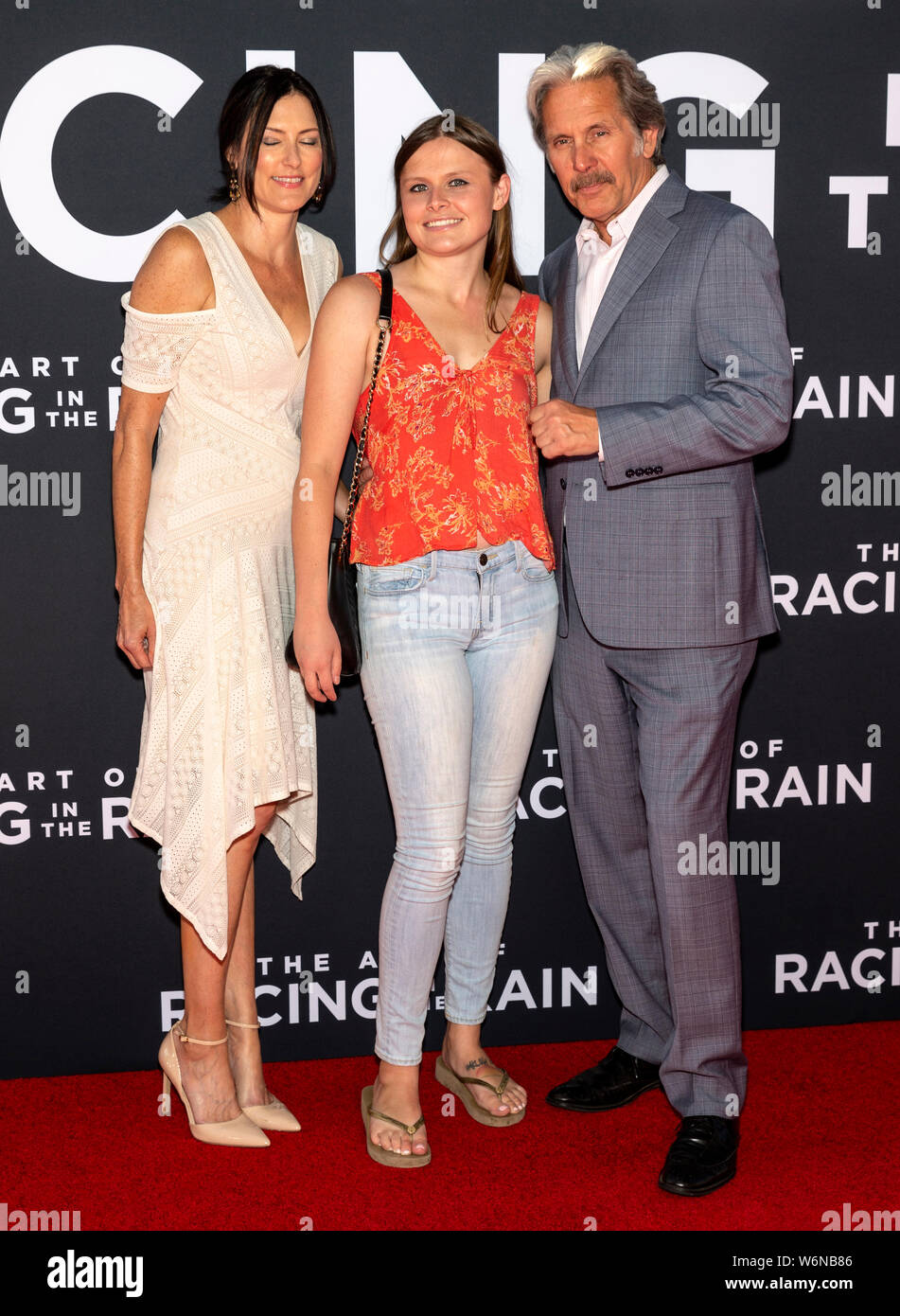 Los Angeles, CA - August 01, 2019: Gary Cole (R) and daughter Mary Cole (C)  attend the premiere Of  'The Art of Racing in the Rain' held at El Capita Stock Photo