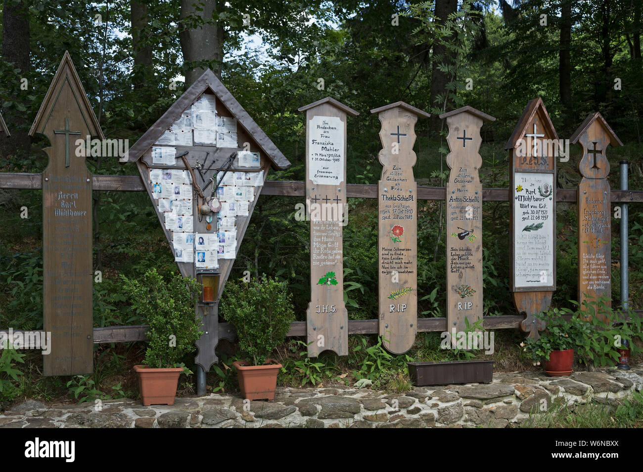 memorial boards and crucifix, Eck, Arrach, Bavarian Forest, Bavaria, Germany Stock Photo