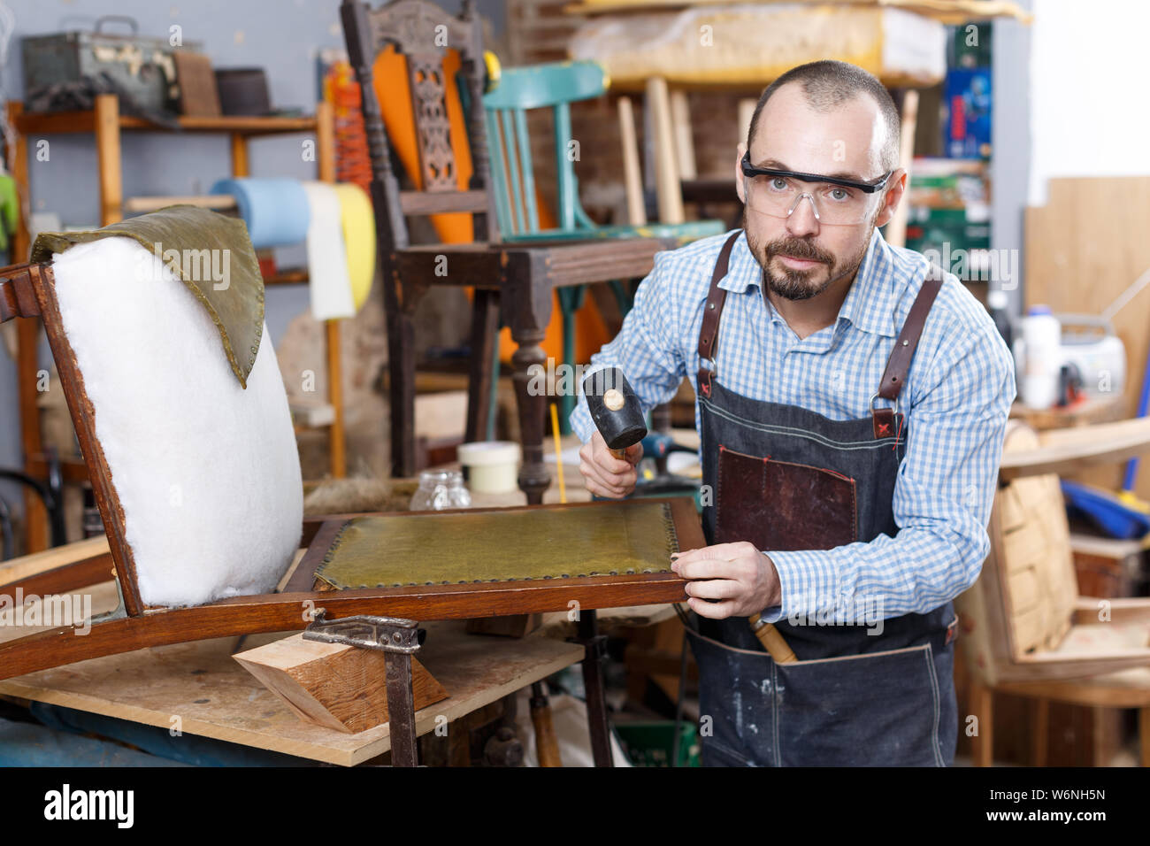 Concentrated Craftsman Using Carpentry Tools For Restoration Old