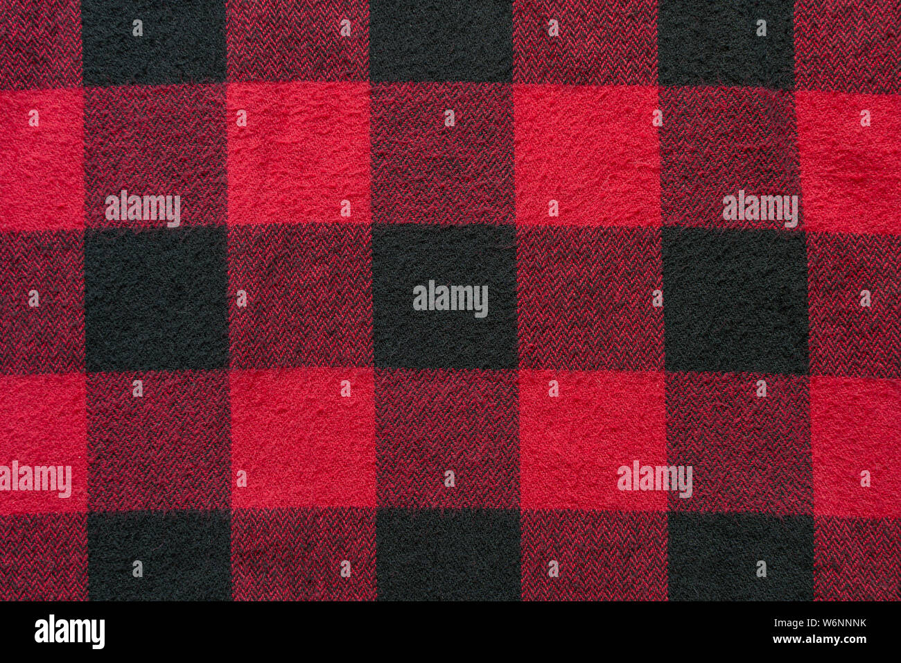 Black and Green Fabric in a Cage. Plaid material. Clothes background Stock Photo