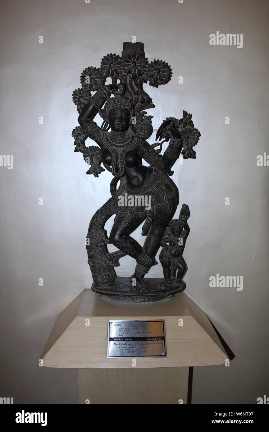 12th century female statue of Lord Vishnu (Mohini) in a museum, National Museum, Janpath, New Delhi, India Stock Photo