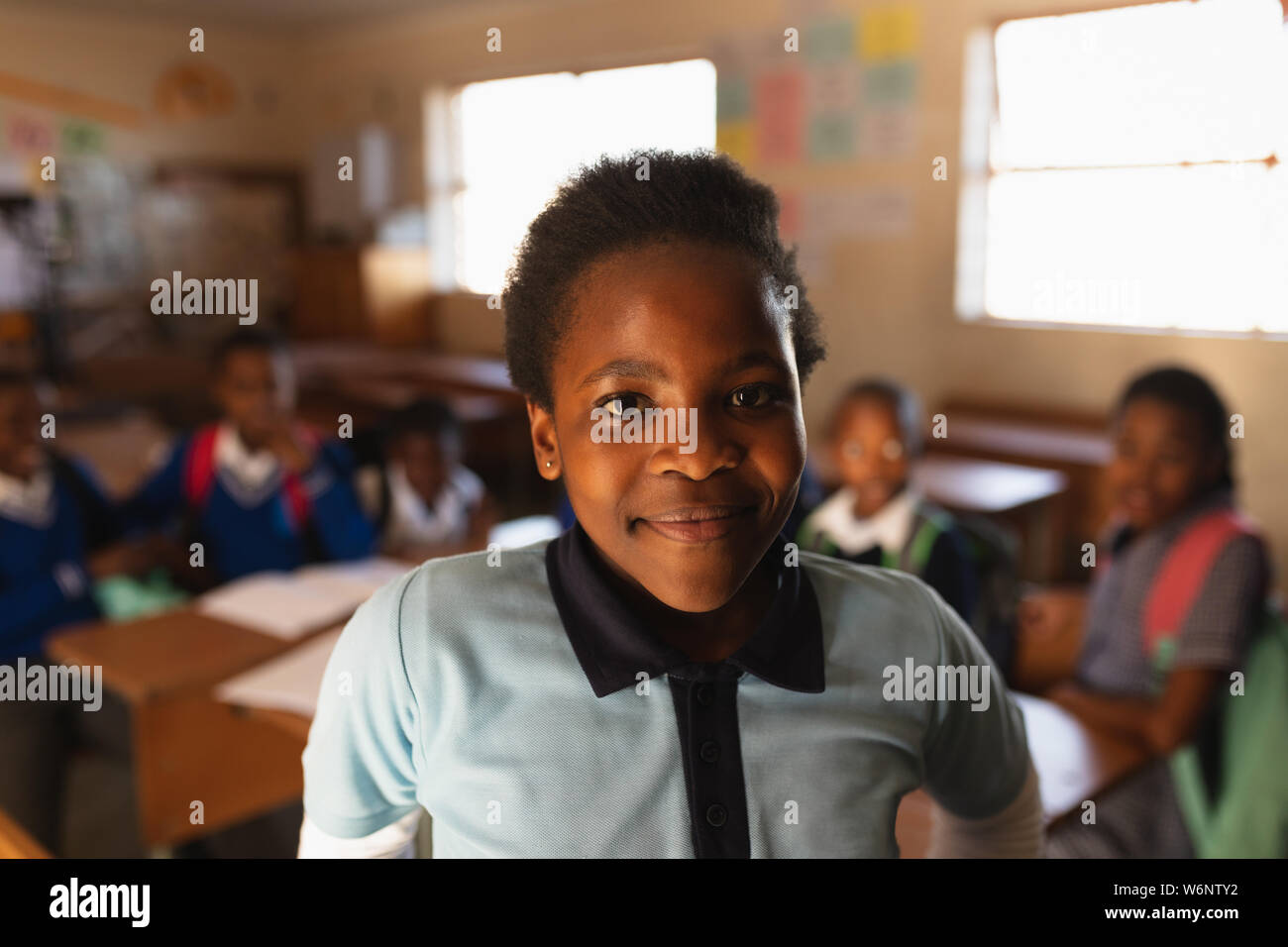 Portrait of a young schoolgirl smiling Stock Photo - Alamy