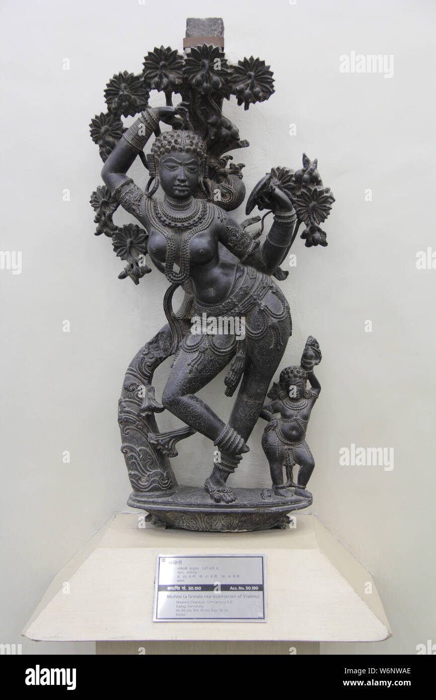 12th century female statue of Lord Vishnu (Mohini) in a museum, National Museum, Janpath, New Delhi, India Stock Photo