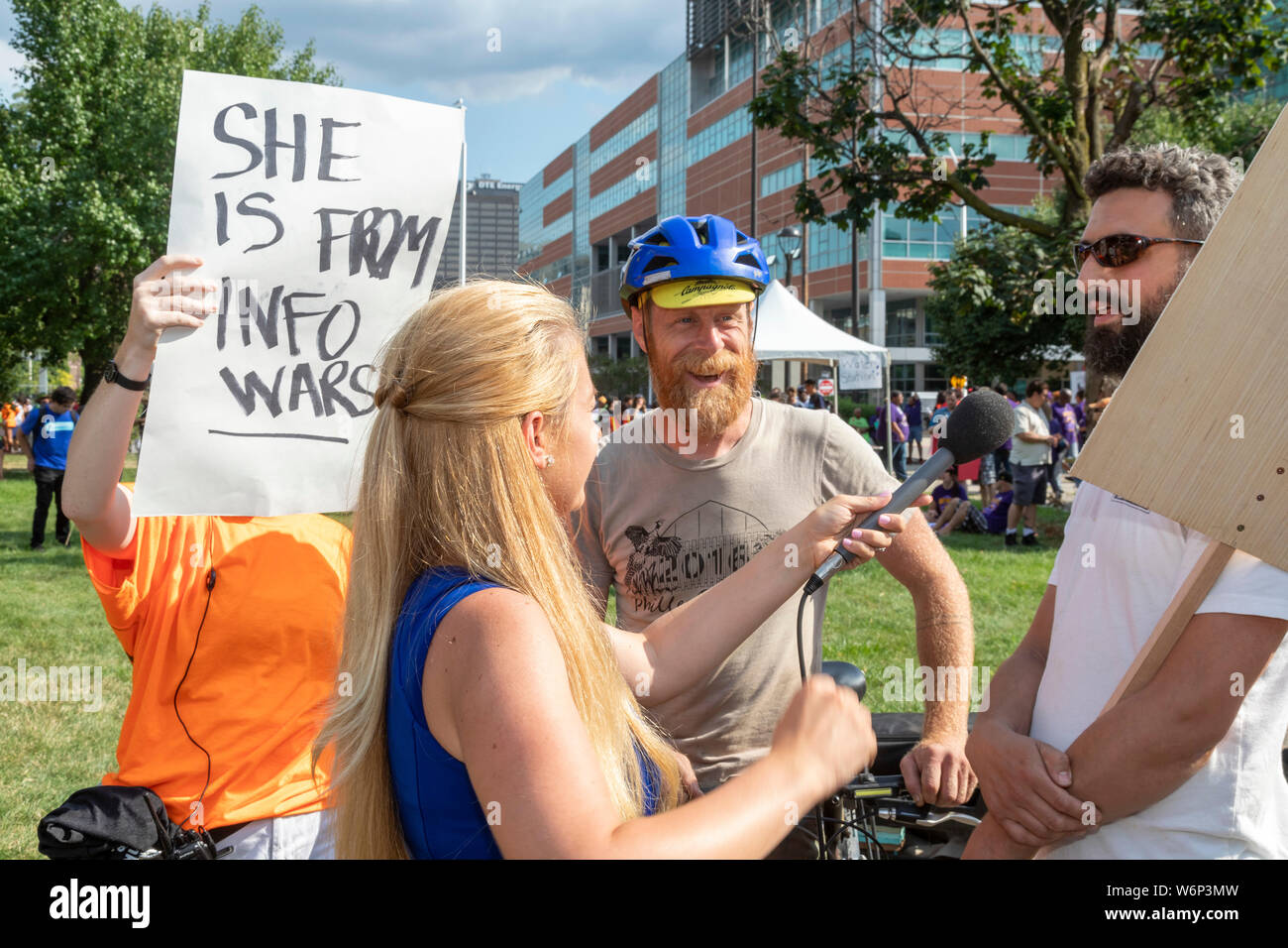 Detroit, Michigan - A reporter from InfoWars, the right-wing fake news website operated by Alex Jones, interviews participants in a rally outside the Stock Photo
