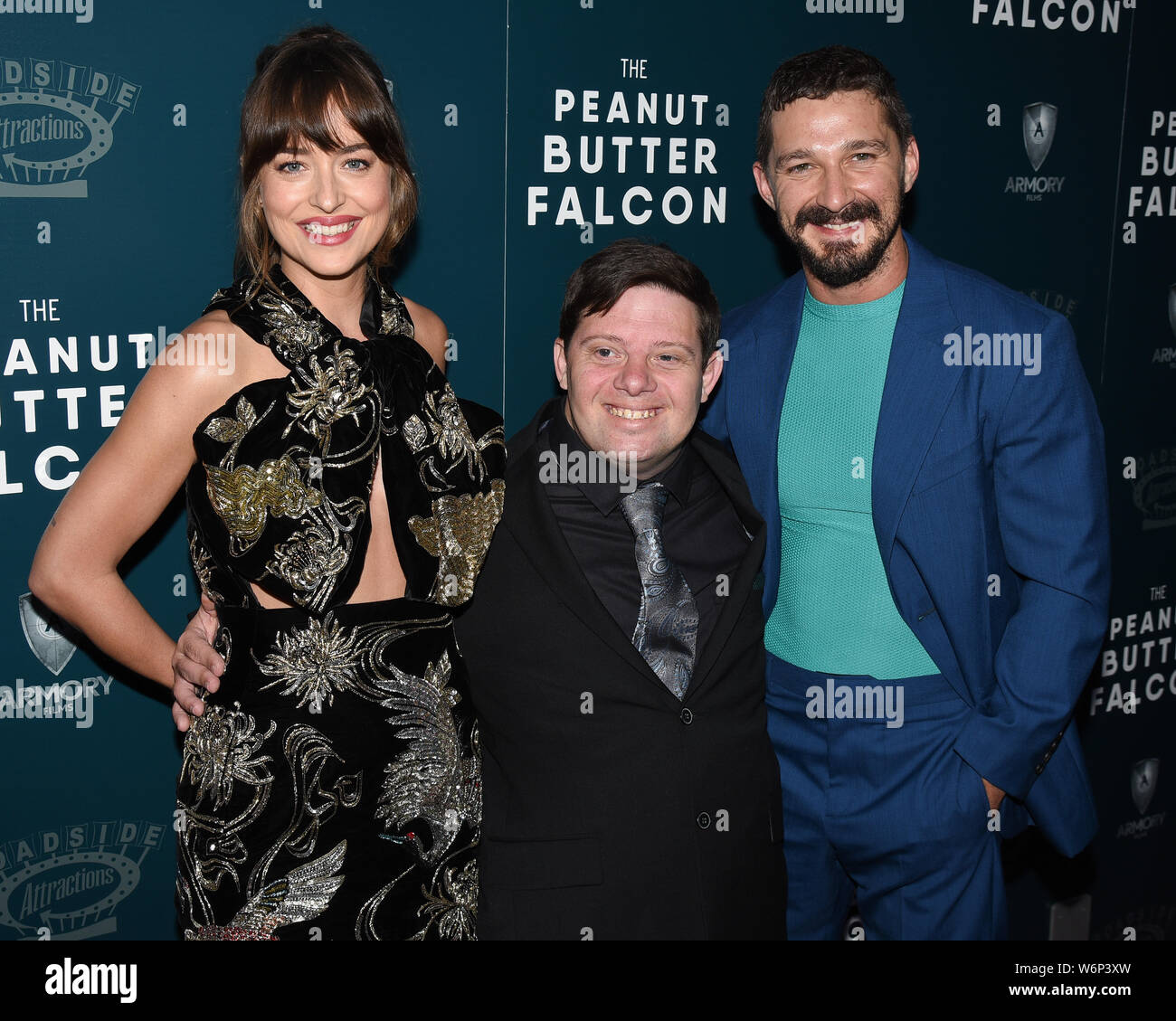 01 August 2019 Hollywood, California Dakota Johnson, Zack Gottsagen