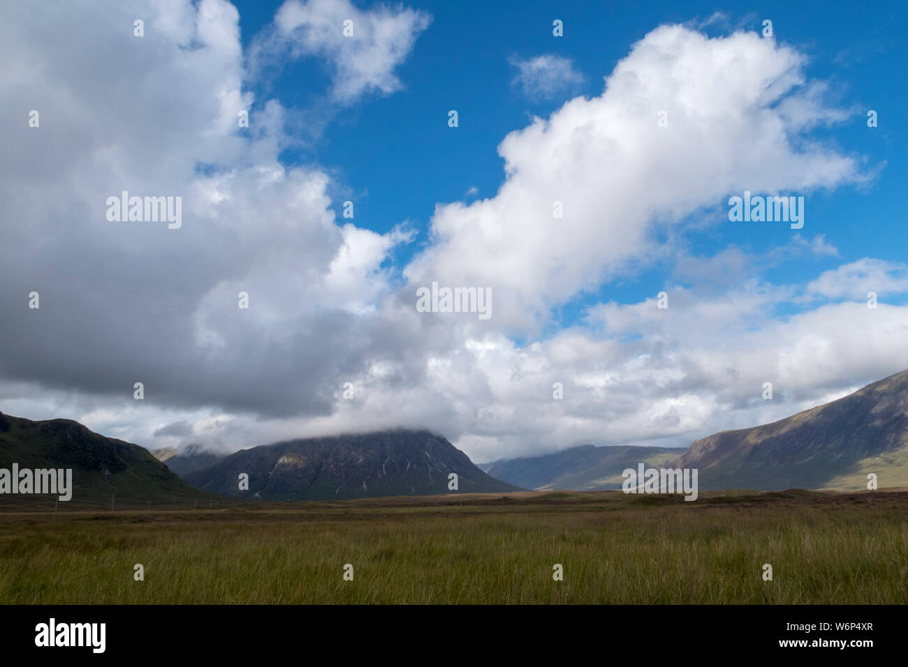 A mountain view near Glencoe, Scotland with wide view blue sky and nice clouds Stock Photo