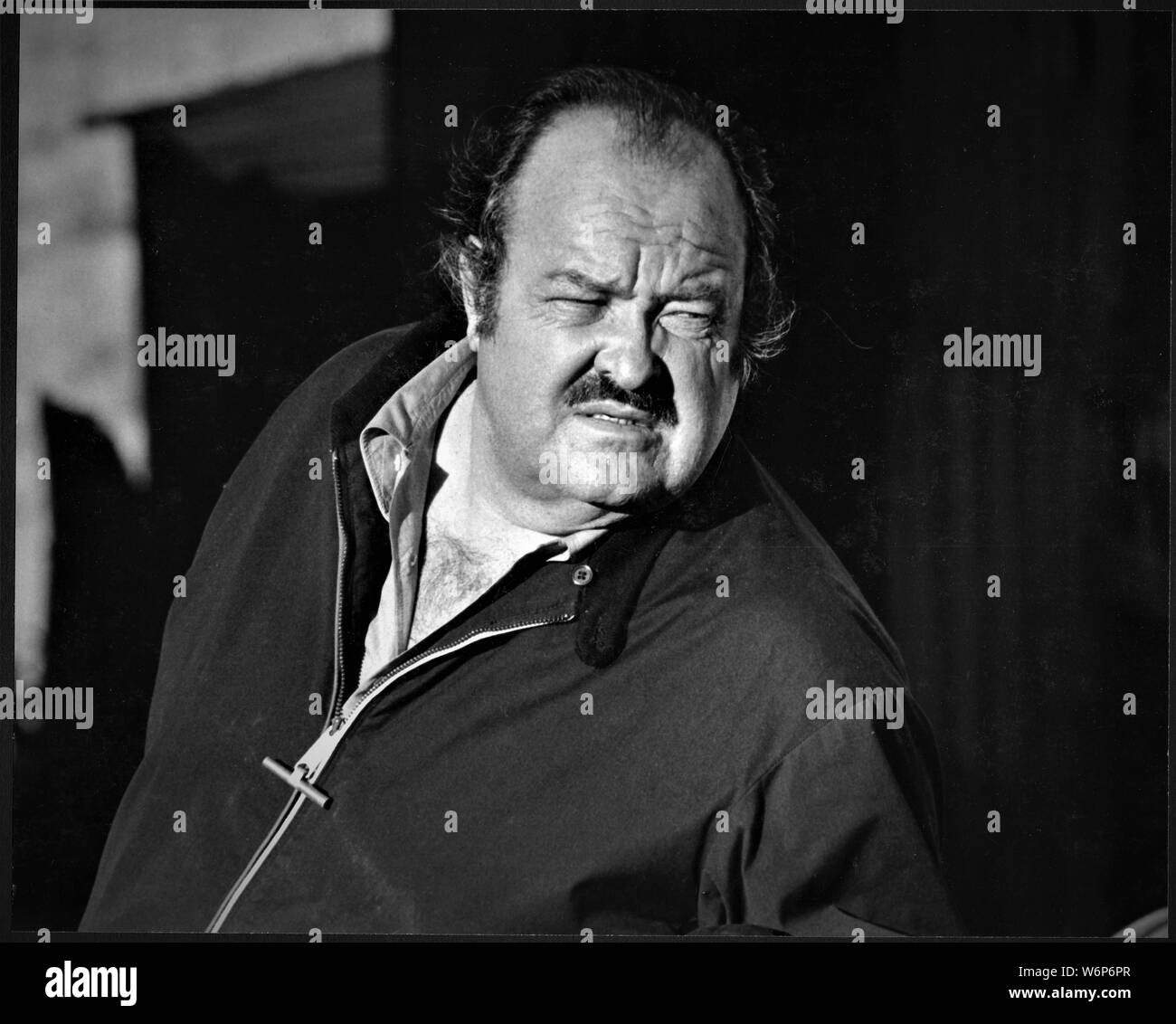 William Conrad (September 27, 1920 – February 11, 1994) was an American World War II fighter pilot, actor, producer, and director whose career spanned five decades in radio, film, and television, peaking in popularity when he starred in the detective series Cannon (1971–1976). He created the role of Marshal Matt Dillon for the radio series Gunsmoke (1952–1961) and narrated the television adventures of Rocky and Bullwinkle (1959–1964) and The Fugitive (1963–1967).  This is shot in Randsburgh California high desert for 'Cannon' TV series. Stock Photo