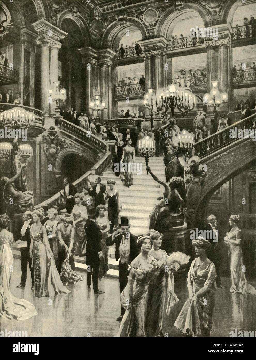 'The Opera in Paris', 1910. 'The Grand Staircase, which provides for French Society a substitute for the splendour and brilliancy of Royal Courts.' From &quot;The Strand Magazine, an illustrated monthly&quot;, Volume XL - July to December 1910. [George Newnes Ltd, London, 1910] Stock Photo