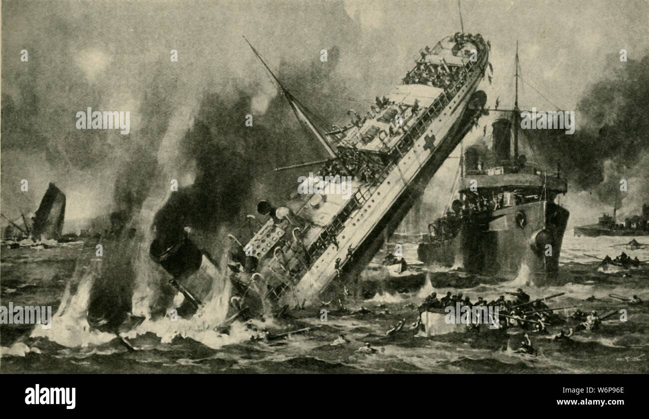 The sinking of the 'Anglia', First World War, 17 November 1915, (c1920). 'Mined in the English Channel: the sinking of the Hospital Ship Anglia'. The British ship SS 'Anglia' was requisitioned as HMHS (His Majesty's Hospital Ship) 'Anglia'. While carrying 390 injured officers and soldiers from France to England, she struck a mine laid by a German U-boat, and sank with the loss of 134 lives. The nearby torpedo gunboat HMS 'Hazard' helped evacuate passengers and crew. From &quot;The Great World War - A History&quot; Volume IV, edited by Frank A Mumby. [The Gresham Publishing Company Ltd, London, Stock Photo