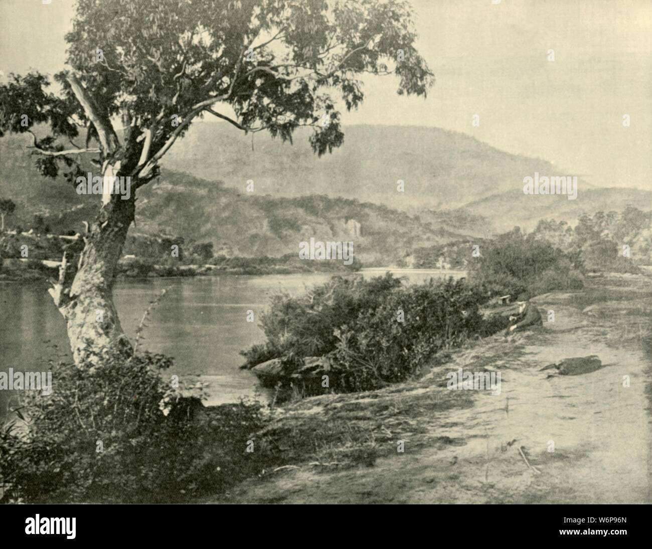 'The Derwent at New Norfolk', 1901. New Norfolk town on the Derwent River, in south-east Tasmania, settled  from November 1807 to October 1808 by farming families who received land grants for relocation. From &quot;Federated Australia&quot;. [The Werner Company, London, 1901] Stock Photo
