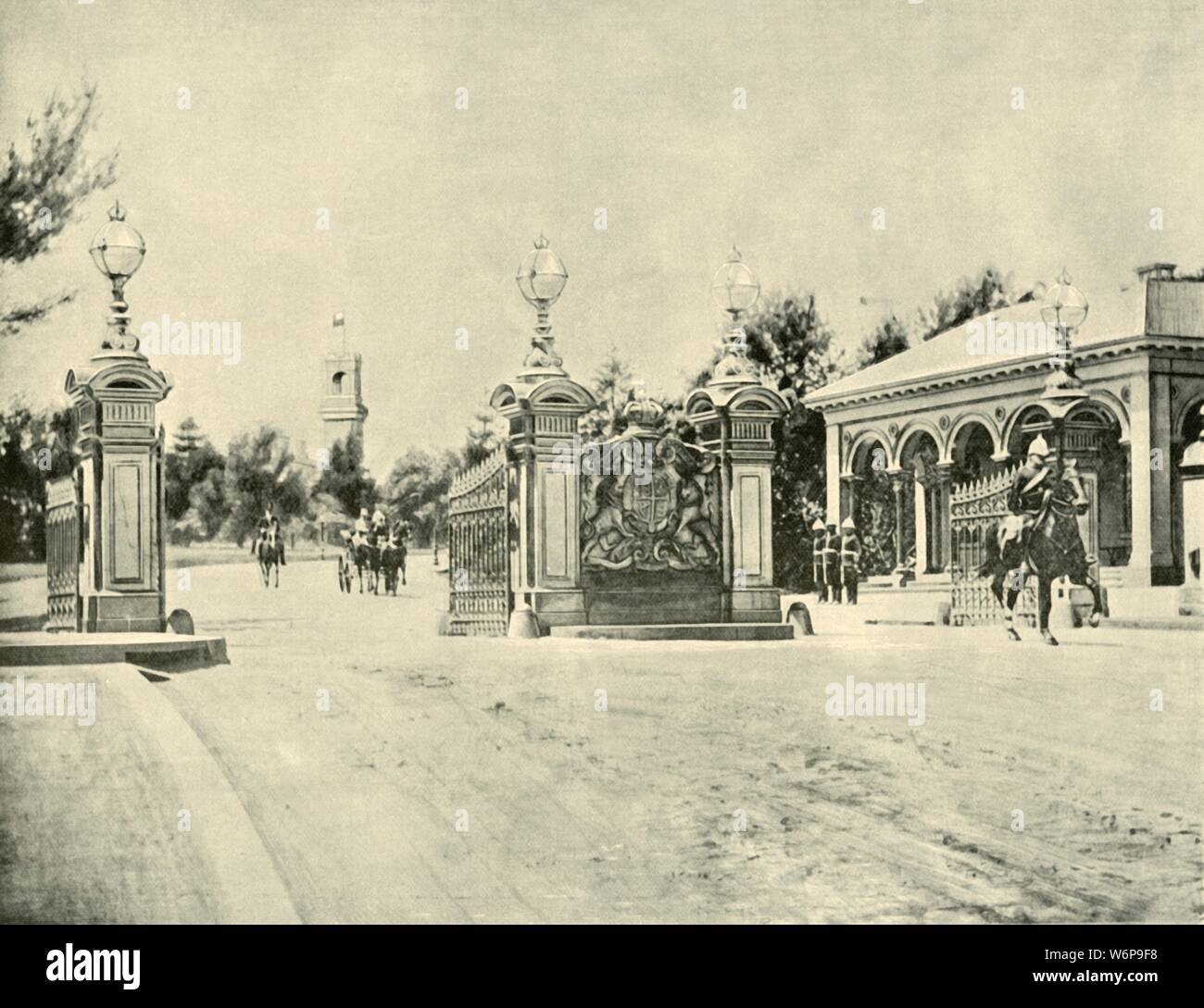 'Entrance to Government House, Melbourne', 1901. Government House was opened in 1876, on land that originally been set aside in 1841. Designed by William Wardell in the Italianate style. From &quot;Federated Australia&quot;. [The Werner Company, London, 1901] Stock Photo