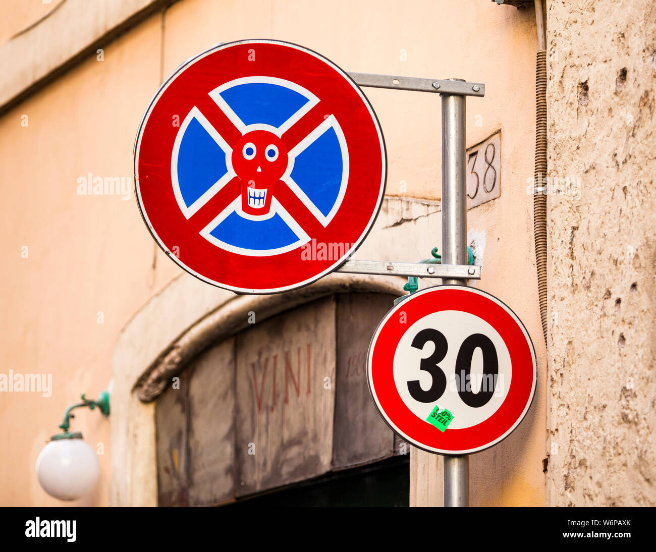 Decorated traffic sign in Rome, Italy Stock Photo