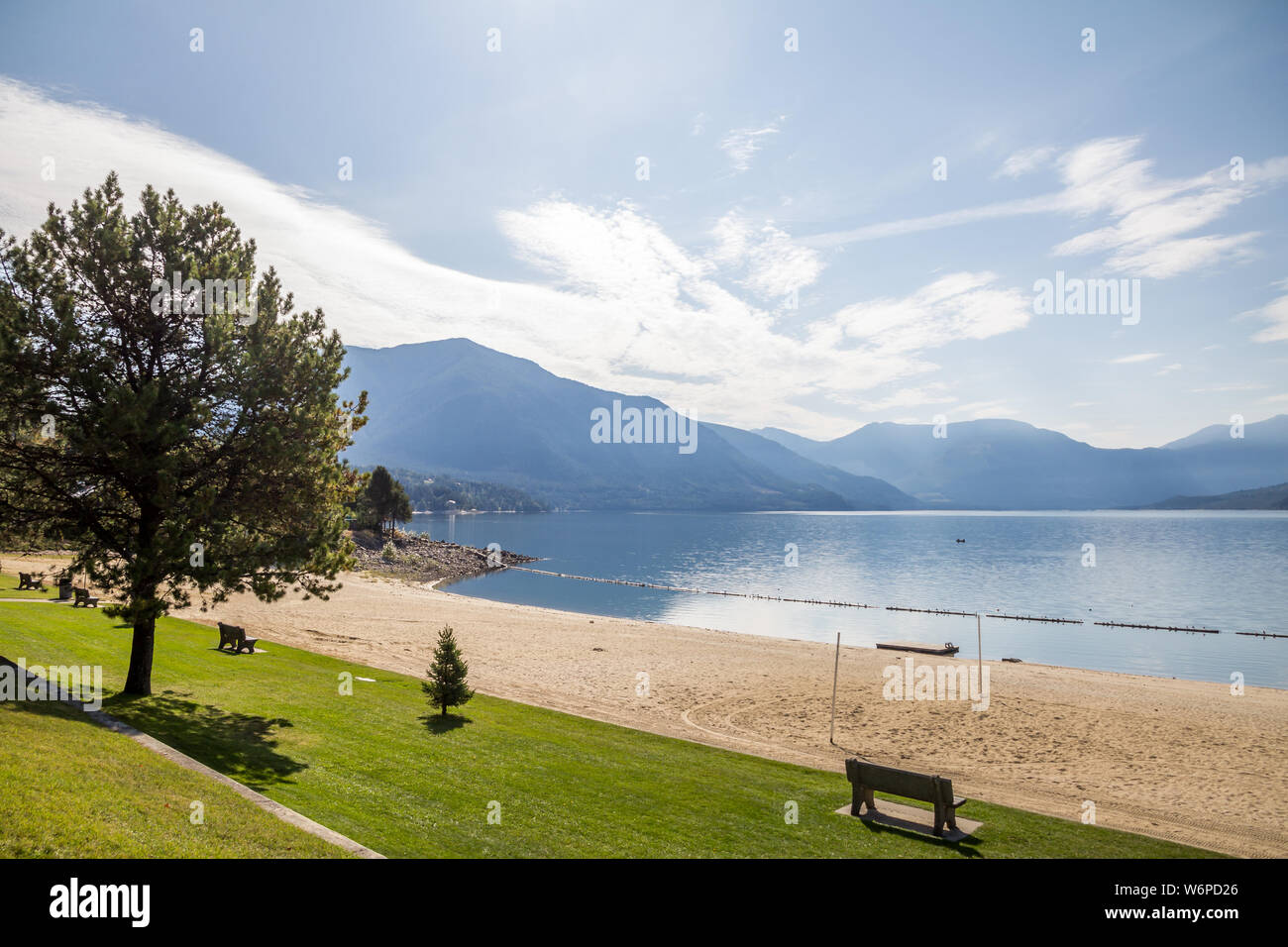 Upper Arrow Lake - part of the Columbia River - and surrounding mountains from Nakusp beach in the West Kootenay region of British Columbia, Canada Stock Photo