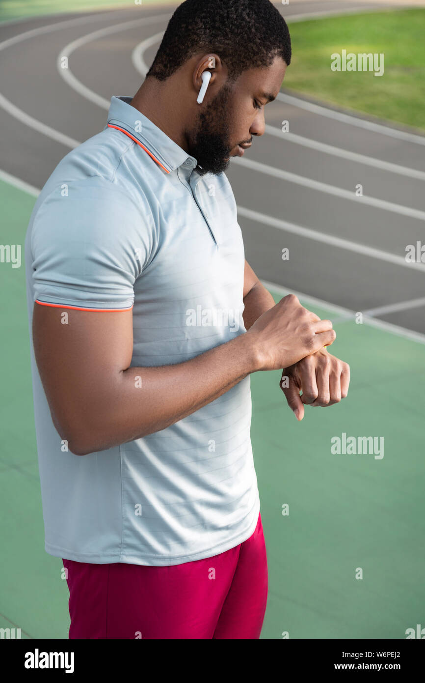 Handsome concentrated young african man hi-res stock photography and ...