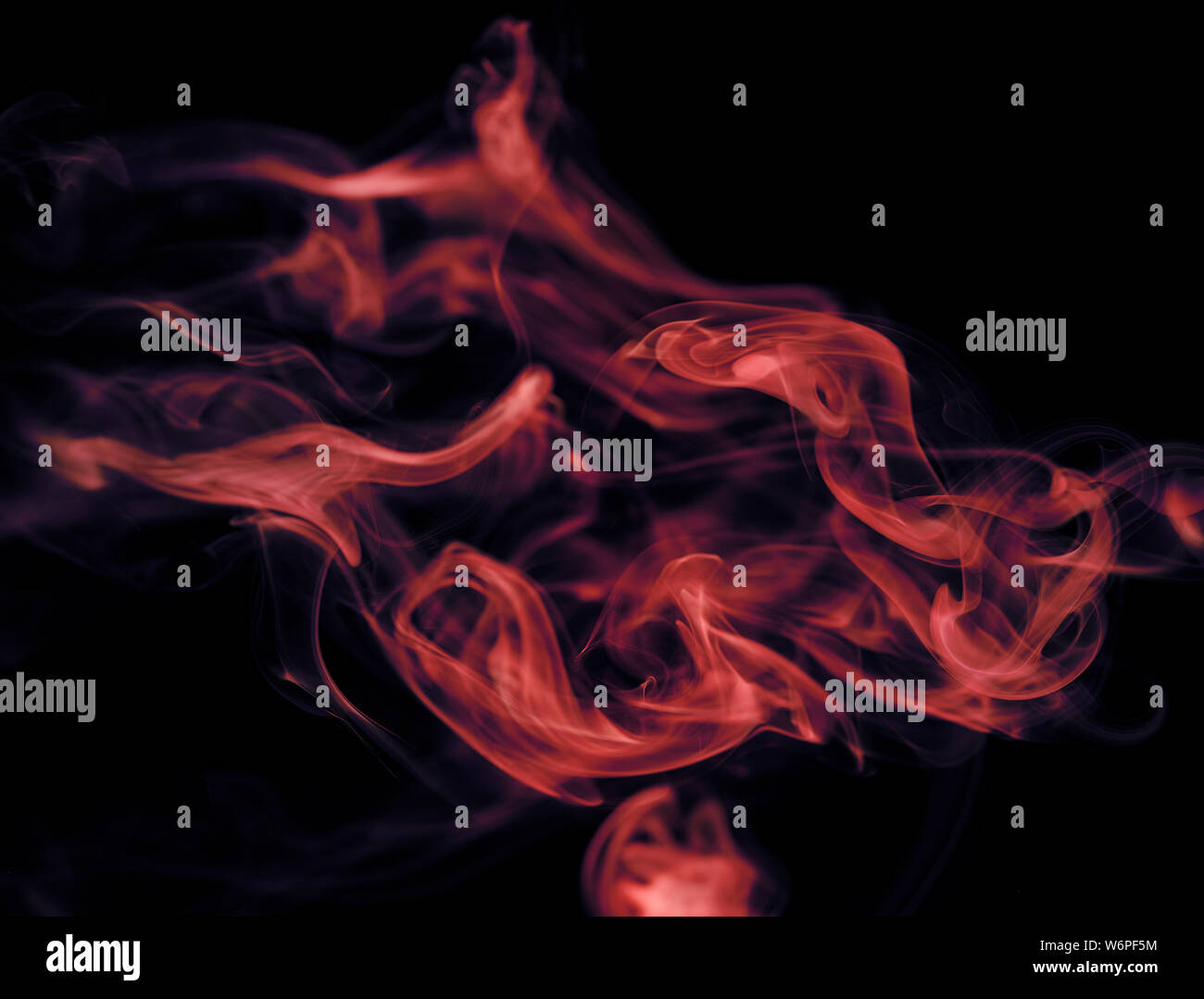Abstract colored wave smoke on black background Stock Photo - Alamy