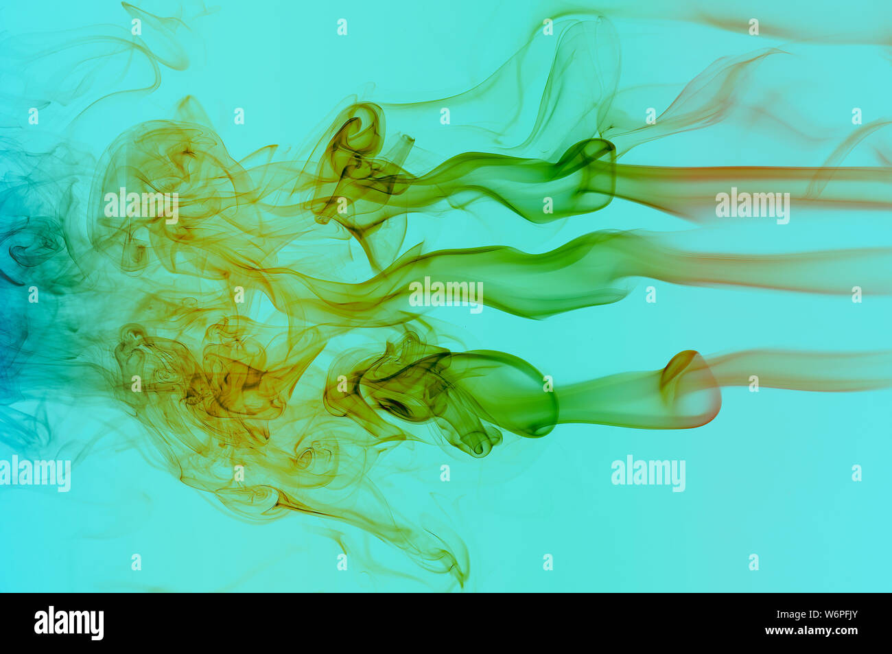 Abstract colored wave smoke on blue background Stock Photo - Alamy