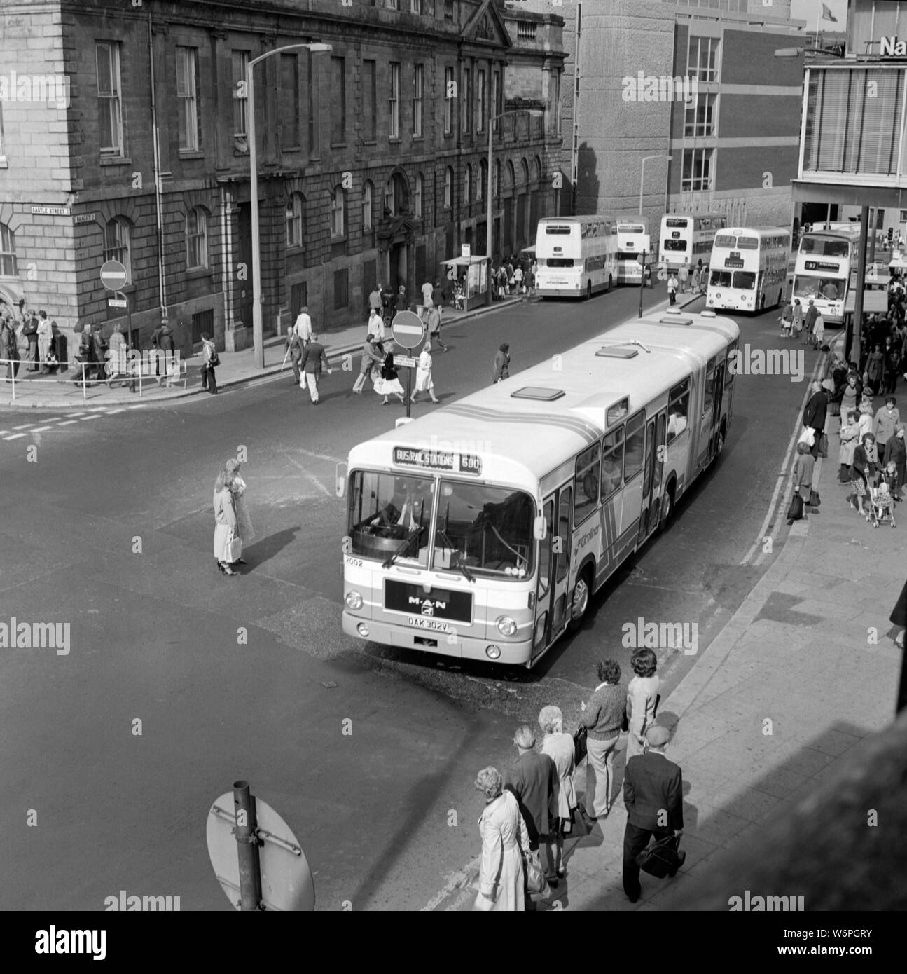 MAN Bendy bus new in 1979 on Waingate, Sheffield. Note the Old Town Hall/ Old Court House in the background while it was fully operational. The Grade II listed building dates back to 1810 but sadly now has fallen into disrepair and dereliction. Stock Photo
