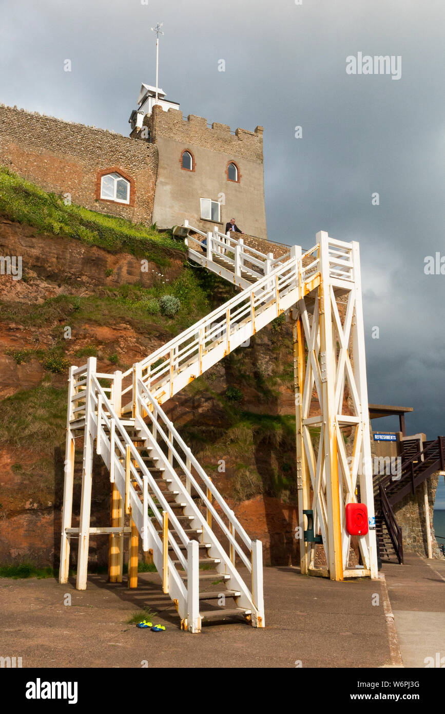 The Clock Tower cafe and bakery (West face) seen from Sidmouth beach, and Jacobs  ladder staircase provides access. Sidmouth UK (110 Stock Photo - Alamy