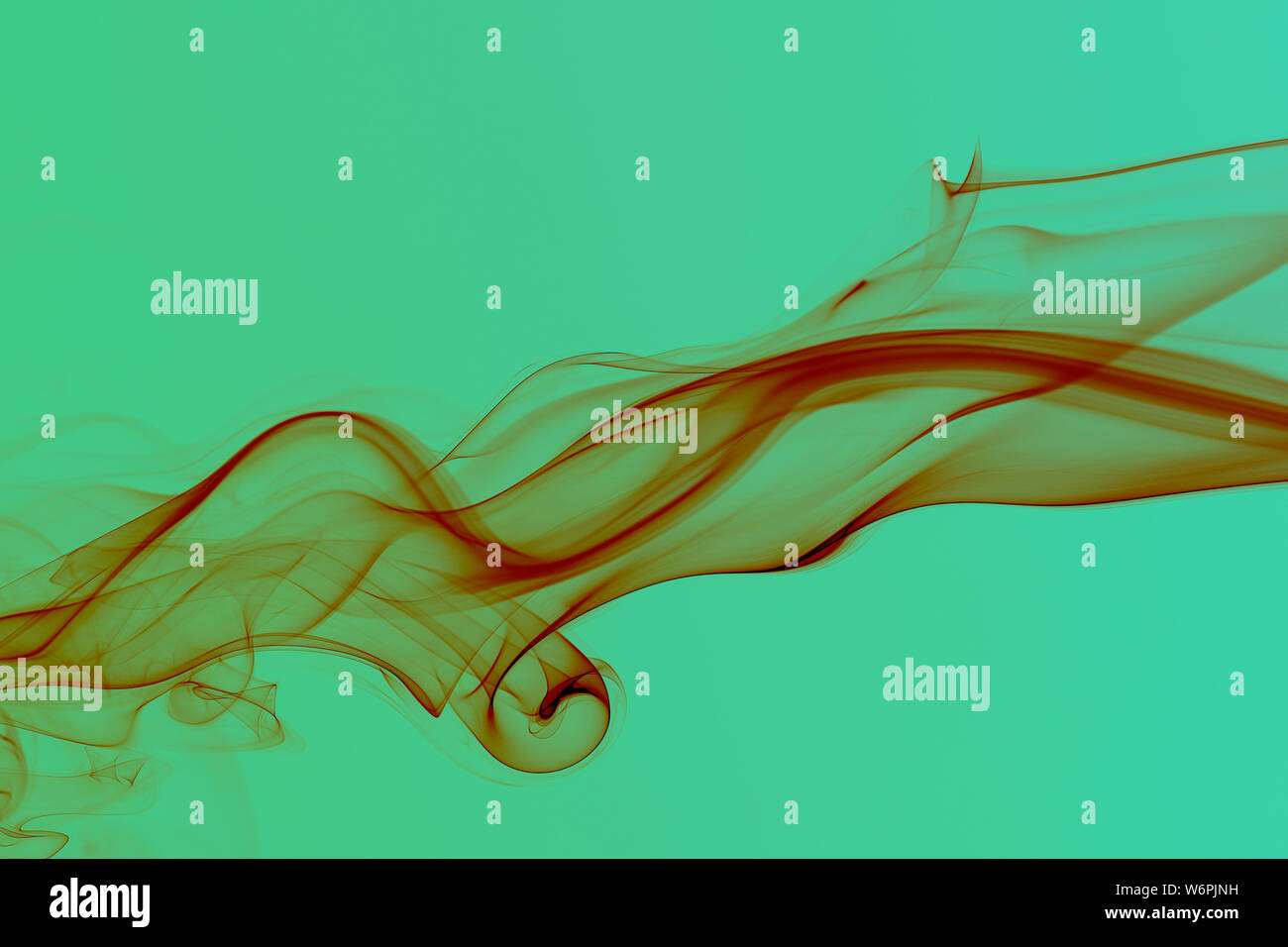 Abstract colored wave smoke on green background Stock Photo - Alamy