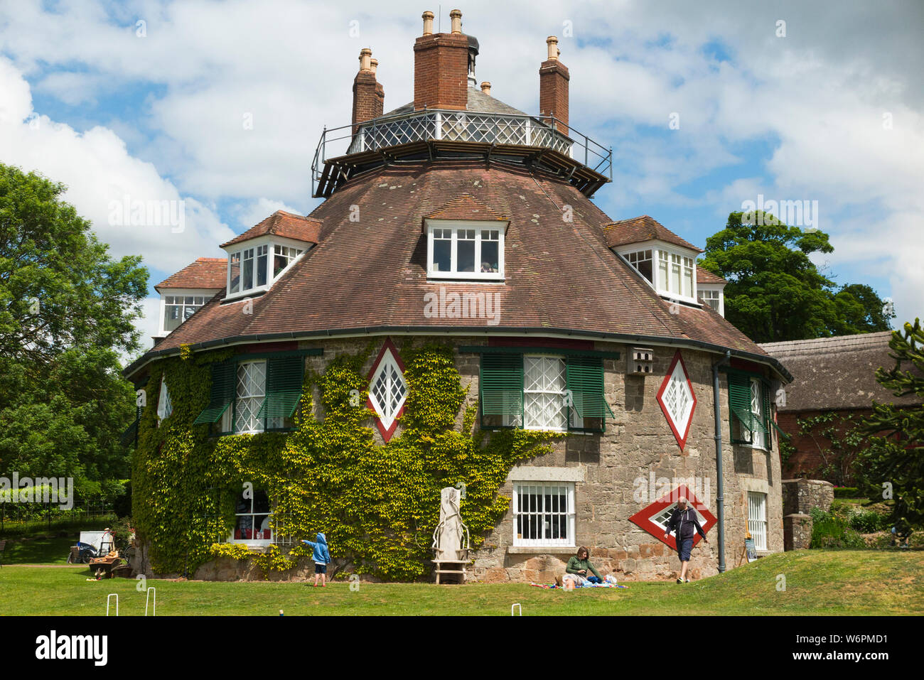 View of the outside exterior of A La Ronde – an 18th-century 16-sided house located near Lympstone, Exmouth, Devon UK – from outside / the gardens  (110) Stock Photo