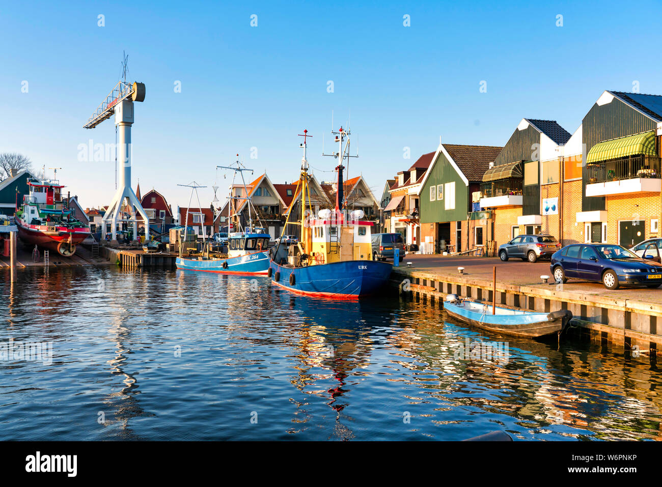 Harbor of small fishing town Urk . Old historical west harbour with old fishing boats, sailing boat Stock Photo