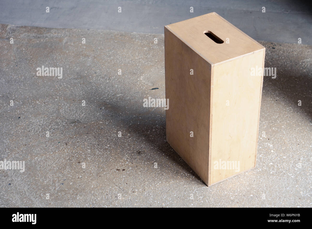 Apple boxes are wooden boxes with holes on each end used chiefly in film production. Stock Photo