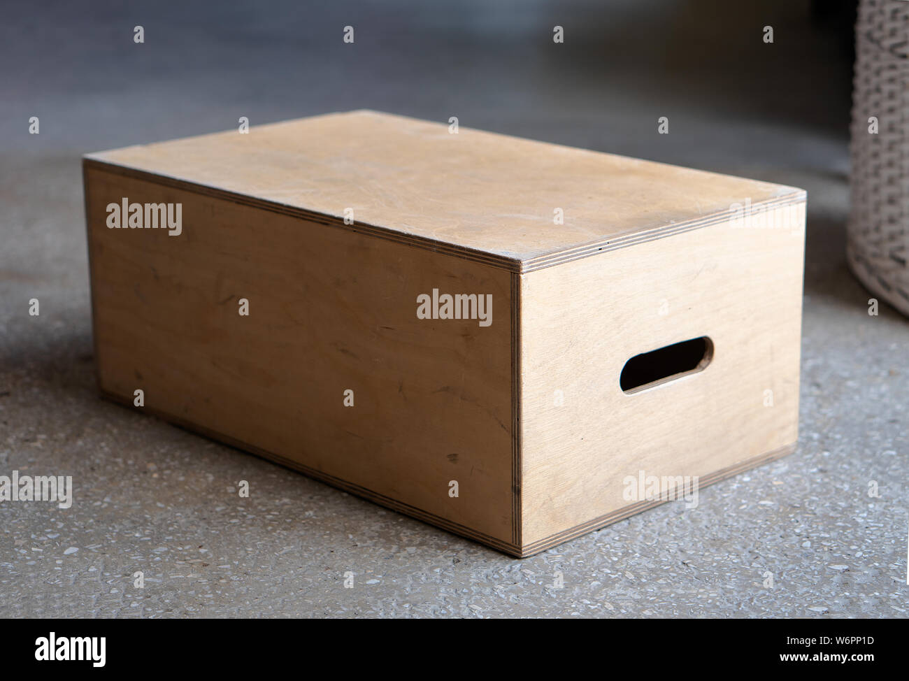 Apple boxes are wooden boxes with holes on each end used chiefly in film production. Stock Photo