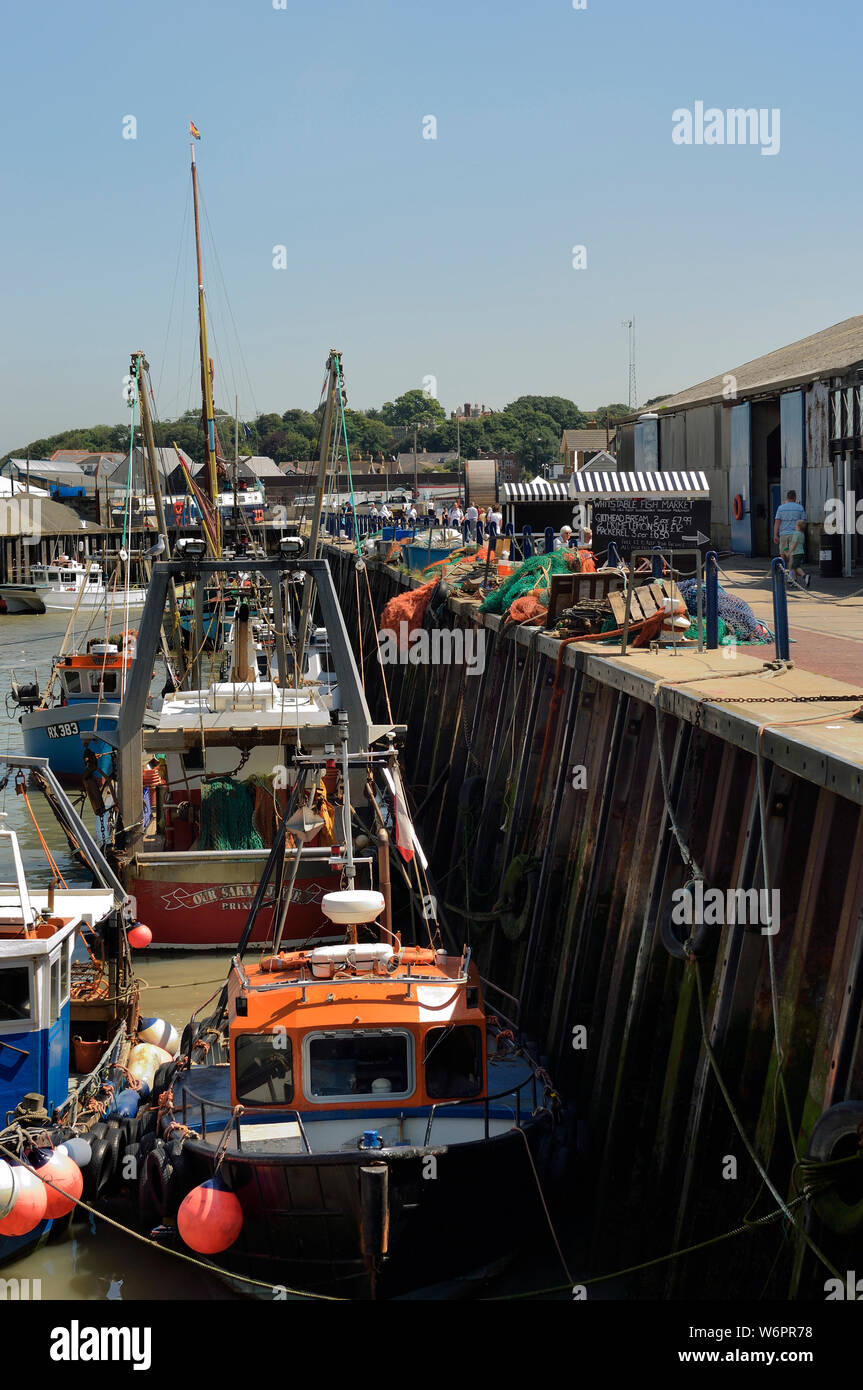 The working harbour at Whitstable, Kent, England, UK Stock Photo