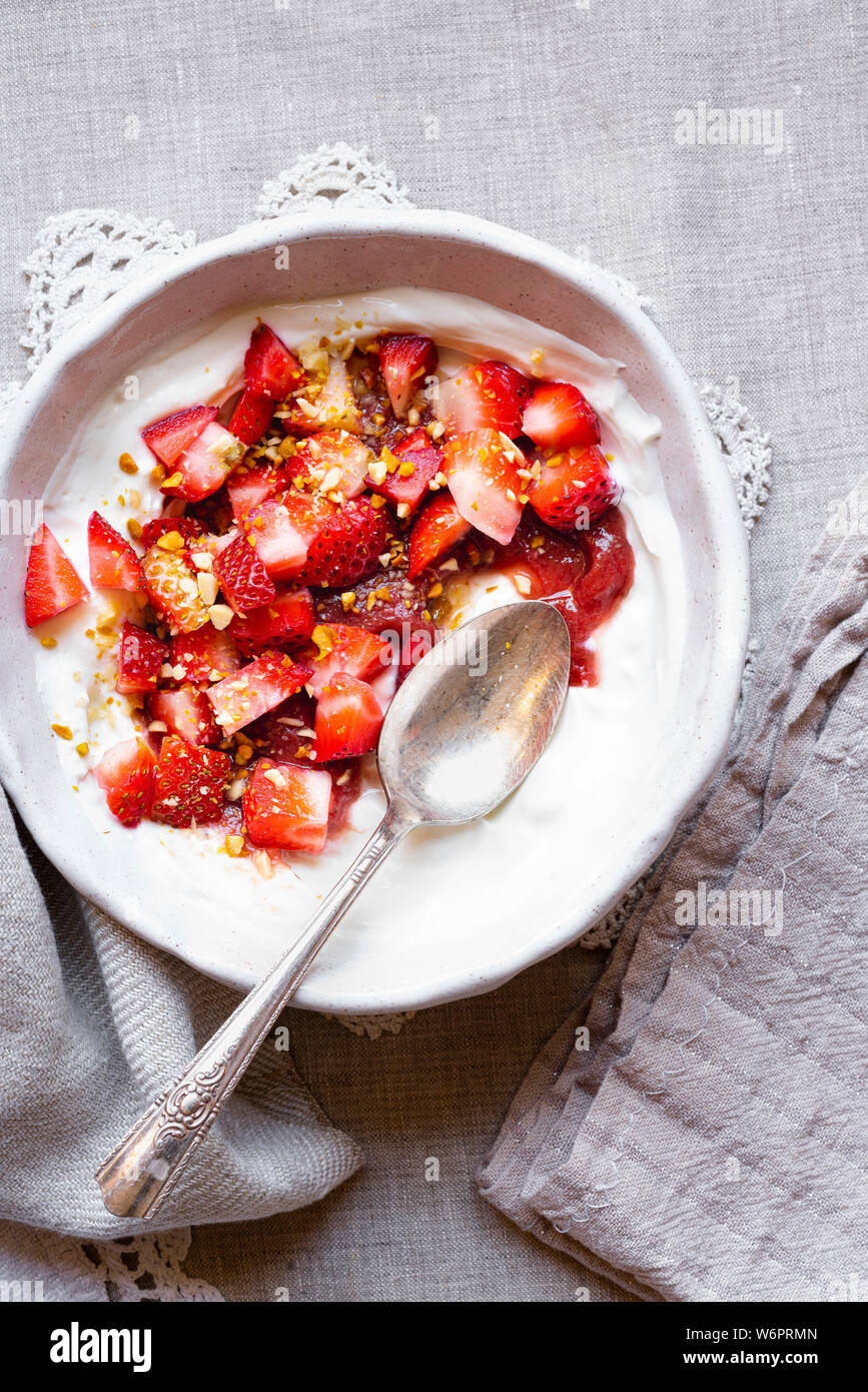 Homemade Greek Yogurt , Mascarpone, Strawberry compote , fresh strawberries and nuts Stock Photo