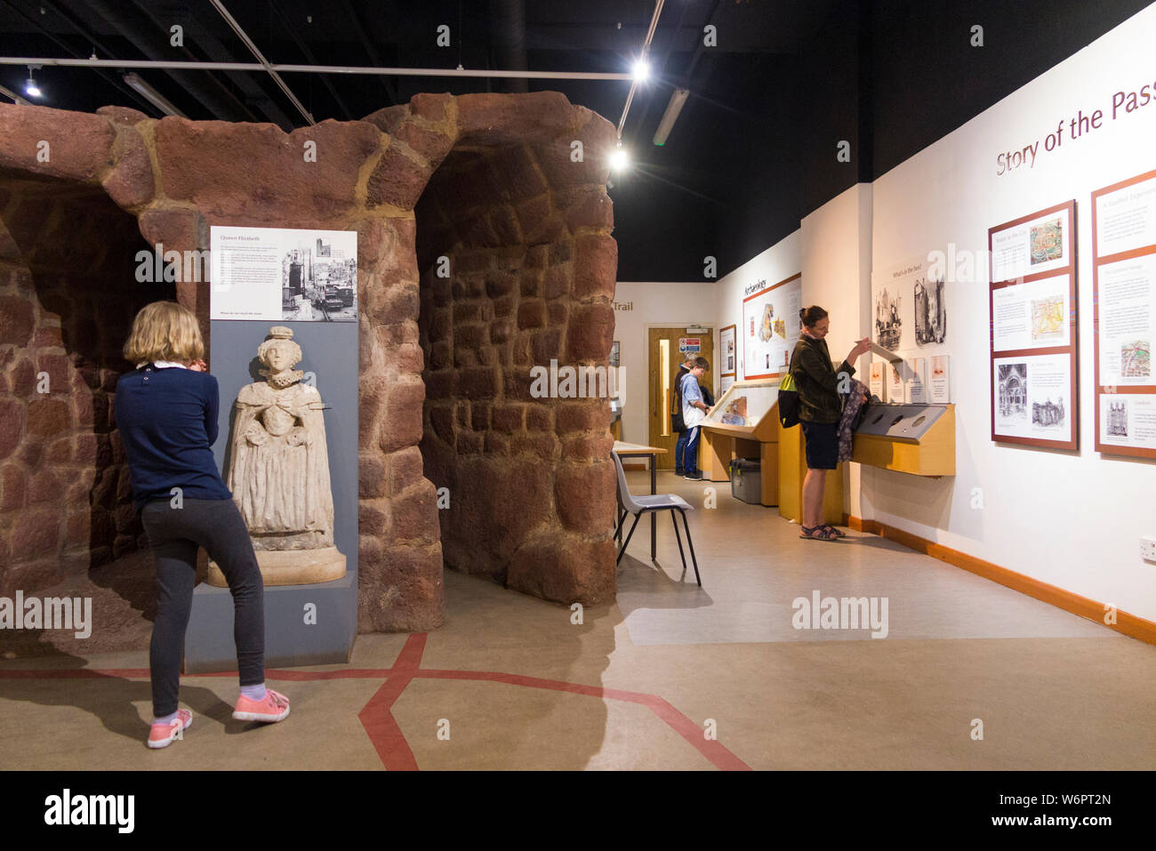 Tourists and visitors inside the Heritage Centre at the start of Exeter