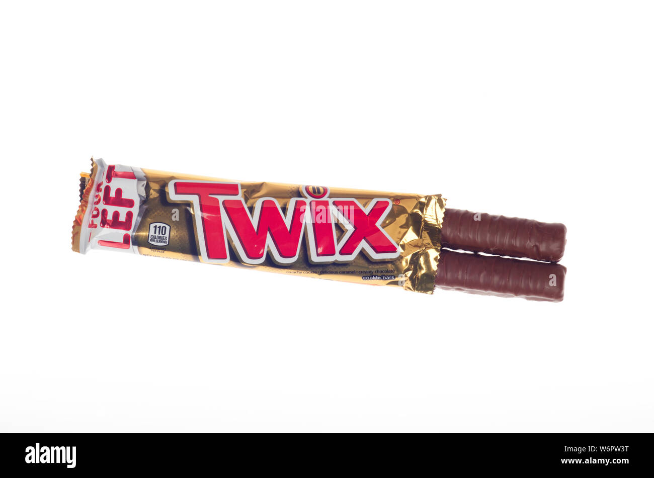 Twix candy bar with 2 pieces coming out of opened wrapper from Mars, Inc Stock Photo