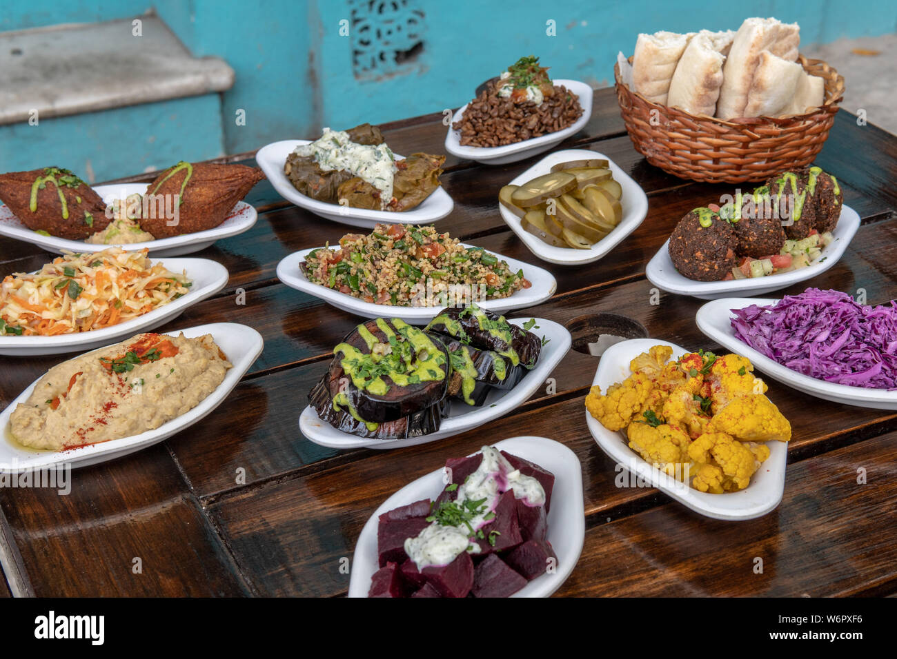 Israeili Mezze plate of vegetables, pickles, hummas, and pite bread Stock Photo