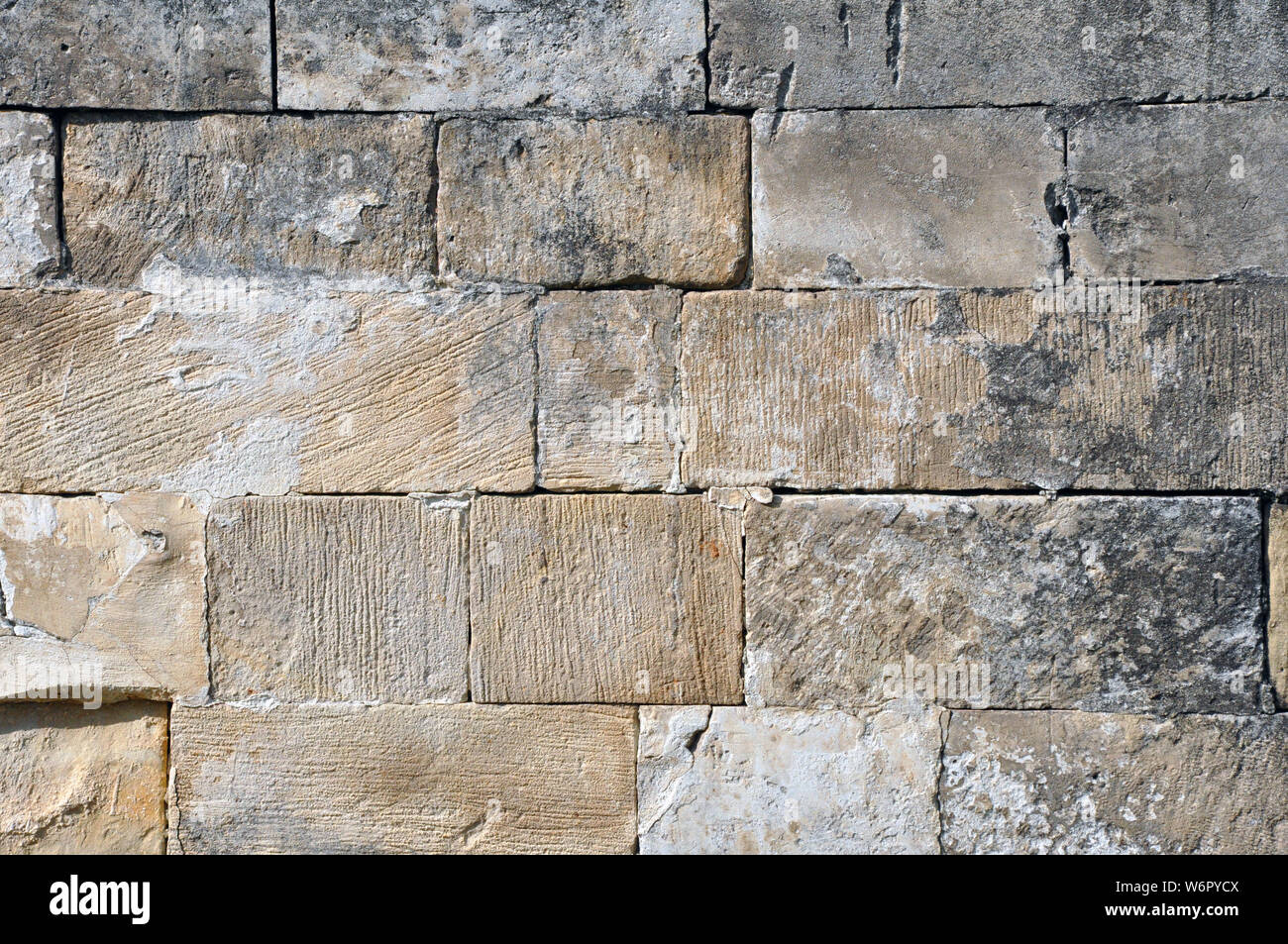 Empty Old Brick Wall Texture. Painted Distressed Wall Surface. Grungy Wide Brickwall. Stock Photo