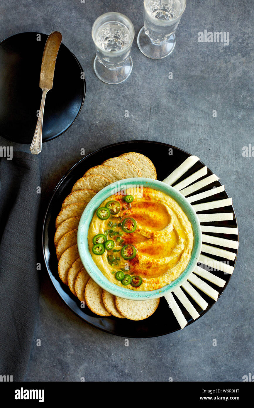 Spicy White Bean Dip served with jicama and crackers Stock Photo Alamy