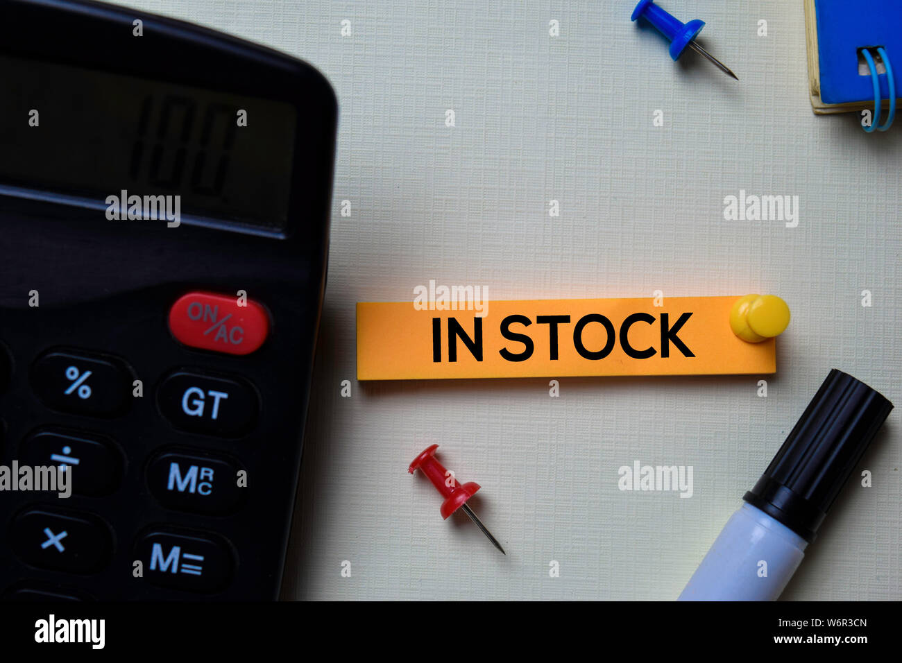 In Stock Text In Stock text on sticky notes isolated on office desk Stock Photo - Alamy