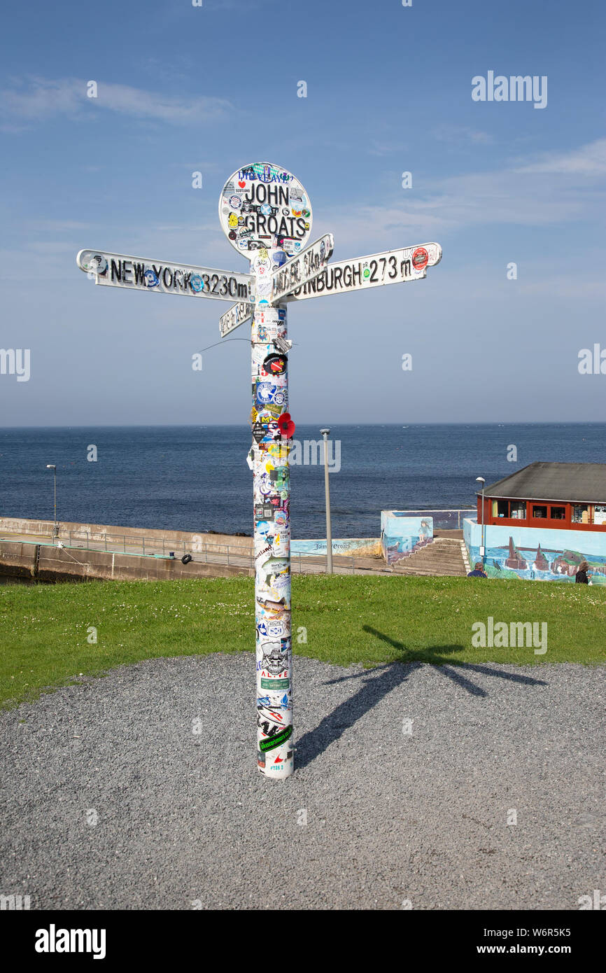 The world famous John O Groats signpost that marks the North Eastern most point of mainland Britain Stock Photo