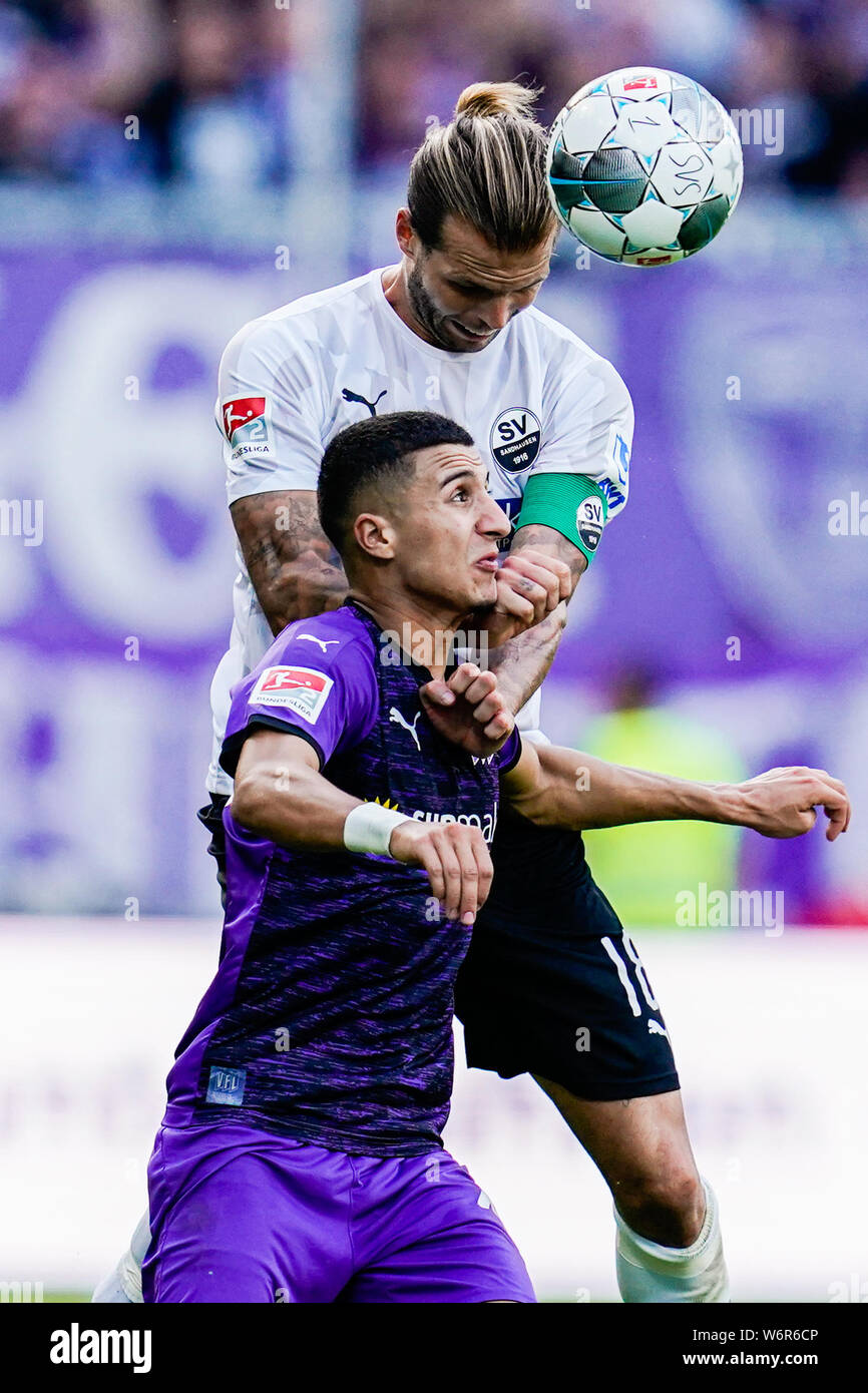 Sandhausen, Germany. 02nd Aug, 2019. Soccer: 2nd Bundesliga, SV Sandhausen - VfL Osnabrück, 2nd matchday, in Hardtwaldstadion. Osnabrück's Anas Ouahim (front) and Sandhausens Dennis Diekmeier fight for the ball. Credit: Uwe Anspach/dpa - IMPORTANT NOTE: In accordance with the requirements of the DFL Deutsche Fußball Liga or the DFB Deutscher Fußball-Bund, it is prohibited to use or have used photographs taken in the stadium and/or the match in the form of sequence images and/or video-like photo sequences./dpa/Alamy Live News Stock Photo