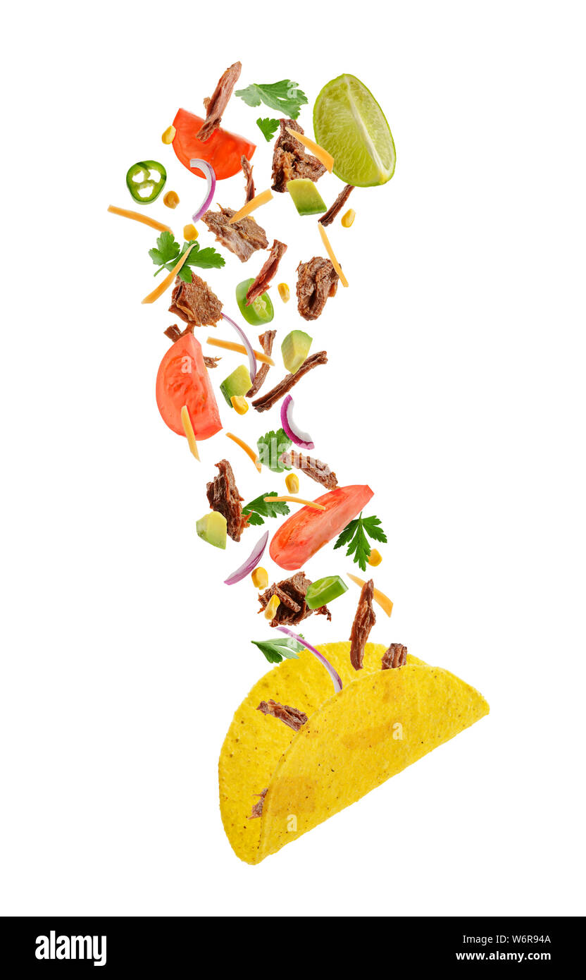 Flying ingredients of hardshell taco Stock Photo Alamy