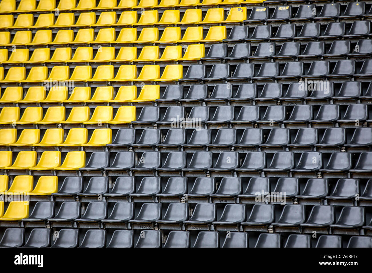 Signal-Iduna-Park, Westfalenstadion, football stadium of BVB Borussia Dortmund, spectator seats in black-yellow club colours, Stock Photo