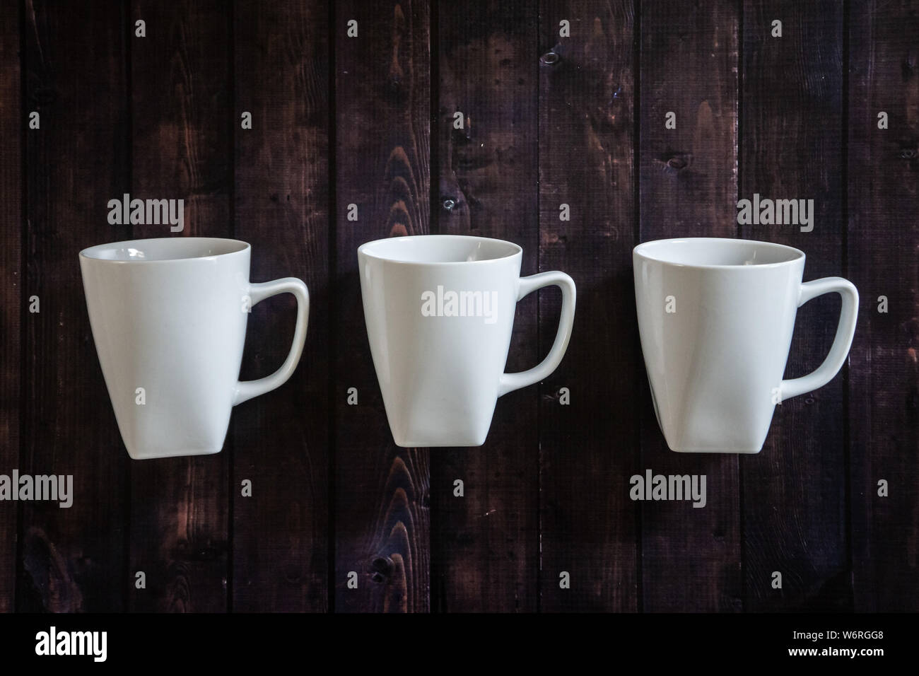 pix Coffee Pick Me Up Drink https www alamy com 3 coffee mugs on a wooden table background morning espresso java pick me up drink three cups of caffeine with blank empty room for text or copy spa image262361352 html